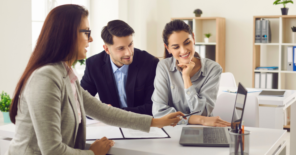 middle-age married couple at a portfolio management meeting