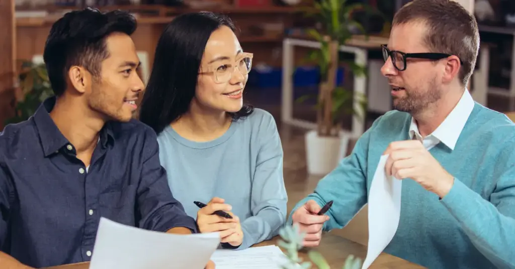 couple discussing equity management with a financial professional