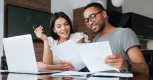 Couple in their early thirties setting financial goals