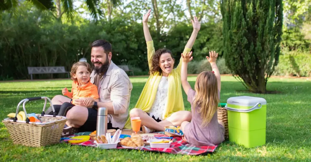Family enjoying a picnic in the park