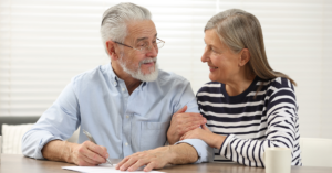 A retired married couple working on their will