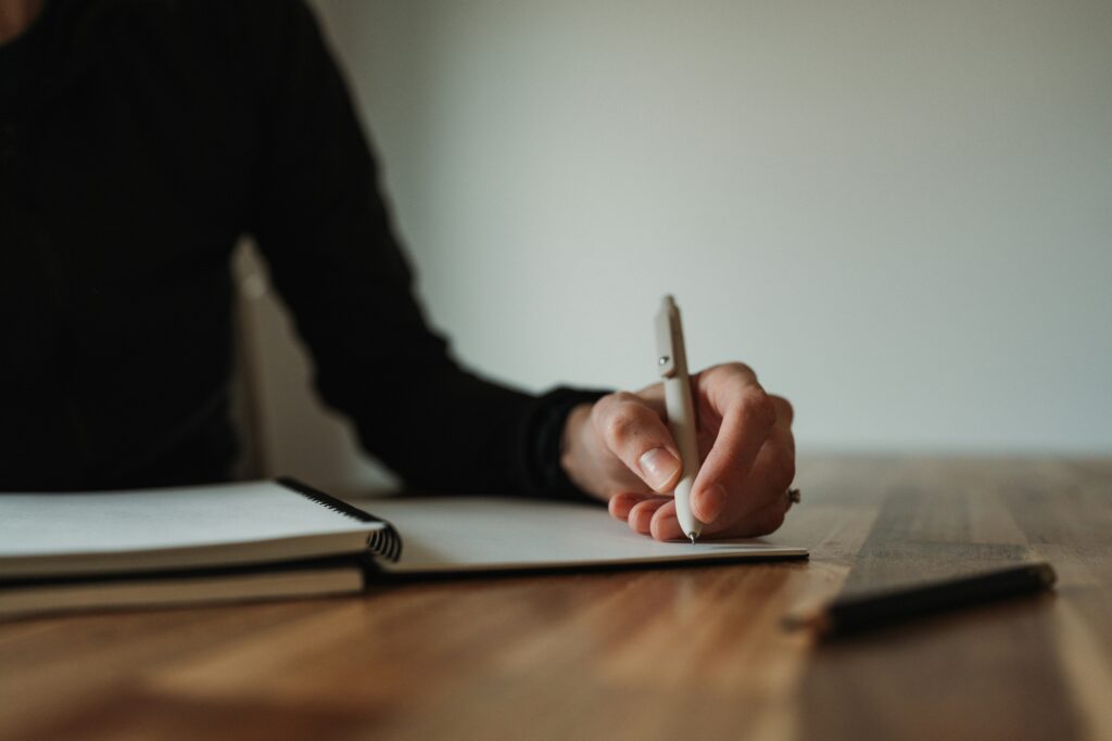 A woman writing a legacy letter