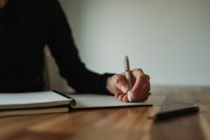 A woman writing a legacy letter